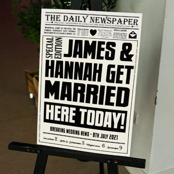 newspaper style wedding welcome sign